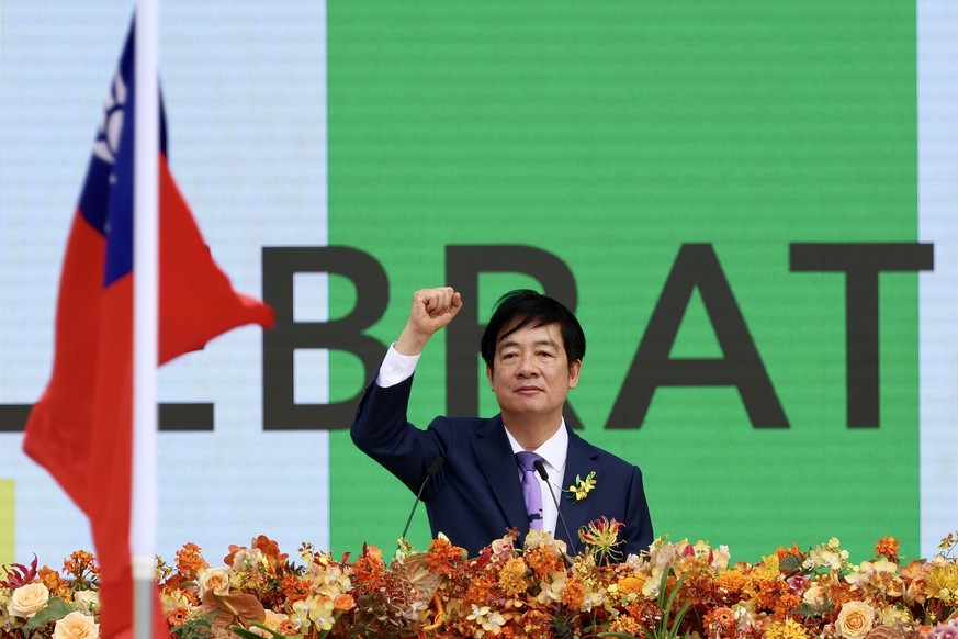 epaselect epa11354635 Taiwan President William Lai (Lai Ching-te), gestures during the Taiwan Presidential Inauguration, in Taipei, Taiwan, 20 May 2024. William Lai (Lai Ching-te) became Taiwan&#039;s ...