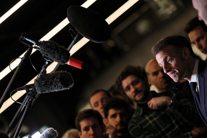 epa12764177 French President Emmanuel Macron speaks to members of the media as he attends the opening day and inauguration of the 62nd International Agricultural Fair (Salon de l'Agriculture) at  ...