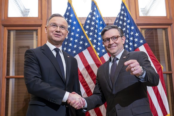 Polish President Andrzej Duda, left, is welcomed for discussions by Speaker of the House Mike Johnson, R-La., at the Capitol in Washington, Tuesday, March 12, 2024. (AP Photo/J. Scott Applewhite)
Andr ...