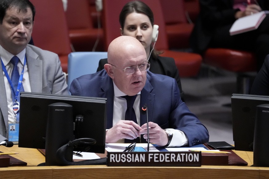 Vassily Nebenzia, Permanent Representative of Russia to the United Nations, speaks during a meeting of the United Nations Security Council to discuss the war in Ukraine, Thursday, Aug. 24, 2023, at Un ...