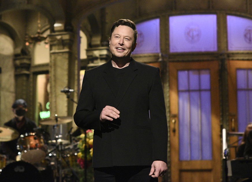 This image released by NBC shows host Elon Musk delivering his opening monologue on &quot;Saturday Night Live&quot; in New York on May 8, 2021. (Will Heath/NBC via AP)