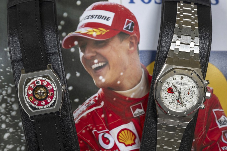 Two watches belonging to Michael Schumacher are on display: F.P., left, Journe, Invenit et Fecit, piece Unique, Vagabondage 1 Model, it is estimated to sell between 1,200,000 to 2,300,000 US dollars a ...