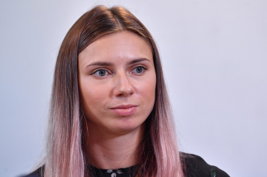 epaselect epa09398396 Defected Belarusian Olympic sprinter Krystsina Tsimanouskaya attends a press conference in Warsaw, Poland, 05 August 2021. Tsimanouskaya and her husband, currently in Ukraine, ha ...