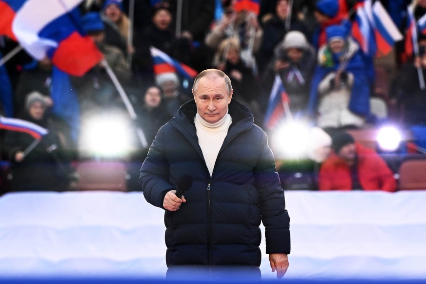 Russian President Vladimir Putin delivers his speech at a concert marking the eighth anniversary of the referendum on the state status of Crimea and Sevastopol and its reunification with Russia, in Mo ...