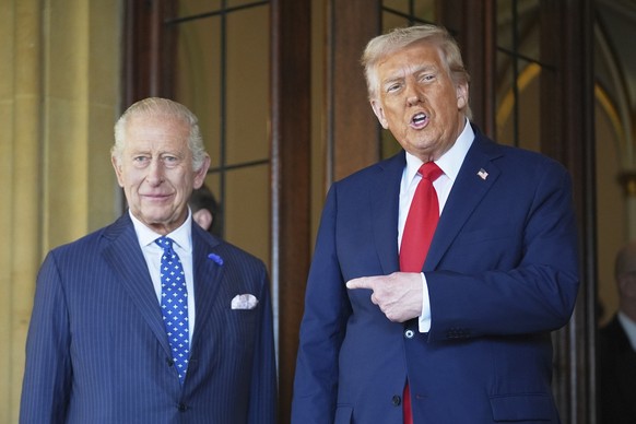 President Donald Trump gestures next to Britain's King Charles III before leaving Windsor Castle, Windsor, England, Thursday, Sept. 18, 2025. (AP Photo/Evan Vucci)
Trump Britain