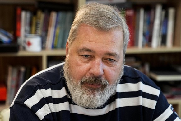 Novaya Gazeta editor Dmitry Muratov speaks during an interview with The Associated Press at the Novaya Gazeta newspaper, in Moscow, Russia, Thursday, Oct. 7, 2021. Colleagues of investigative reporter ...