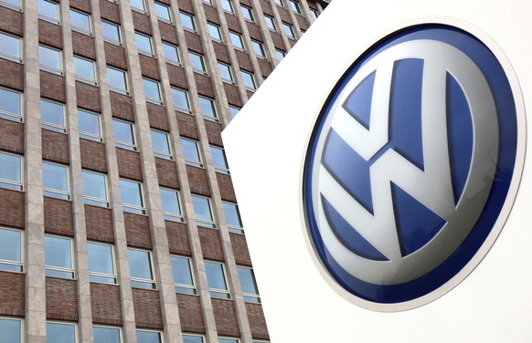 FILE - In this April 13, 2018 file photo, Volkswagen logo is pictured in front of a company building in Wolfsburg, Germany. (AP Photo/Michael Sohn, File)
Germany Volkswagen Diesel Emissions