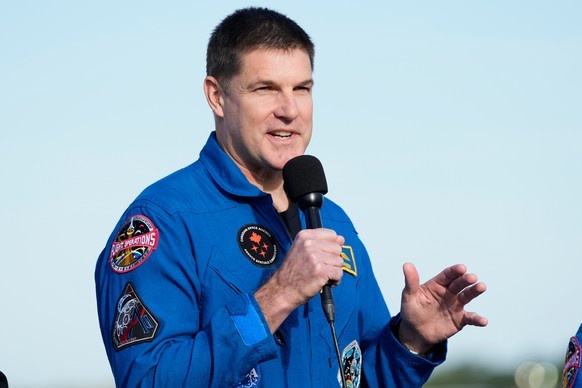 Canadian Space Agency astronaut Jeremy Hansen, crew member of NASA's new moon rocket, Artemis II, answers questions during a news conference at the Kennedy Space Center, Saturday, Jan. 17, 2026,  ...