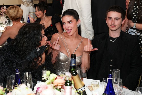 (EDITOR'S NOTE: Image contains profanity.) Odessa A'zion, Kylie Jenner, Timothée Chalamet at the 83rd Annual Golden Globes held at The Beverly Hilton on January 11, 2026 in Beverly Hills, Ca ...