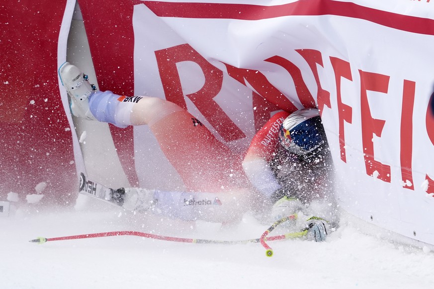 Switzerland's Franjo von Allmen crashes at the finish area of an alpine ski, men's World Cup downhill, in Wengen, Switzerland, Saturday, Jan. 17, 2026. (AP Photo/Giovanni Zenoni)
Franjo von  ...