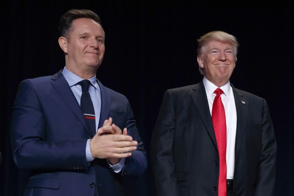 FILE - Television producer Mark Burnett, left, looks on as President Donald Trump arrives for the National Prayer Breakfast, Feb. 2, 2017, in Washington. (AP Photo/Evan Vucci, File)
Donald Trump,Mark  ...