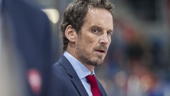 Switzerland&amp;#039;s head coach Patrick Fischer looks on during an ice hockey World Cup preparation match between Switzerland and France at the St. Jakob-Arena in Basel, Switzerland, on Saturday, Ap ...