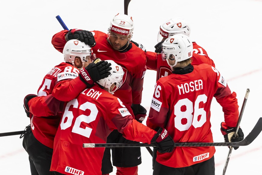 epa12119308 Switzerland&#039;s forward Sven Andrighetto (L) celebrates his goal with his teammates during the IIHF 2025 Ice Hockey World Championship preliminary round group B game between Switzerland ...