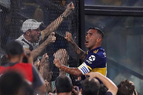 epa08277638 Carlos Tevez of Boca Juniors celebrates after scoring during an Argentine Superliga soccer match between Boca Juniors and Club de Gimnasia y Esgrima La Plata, at Estadio Alberto J. Armando ...