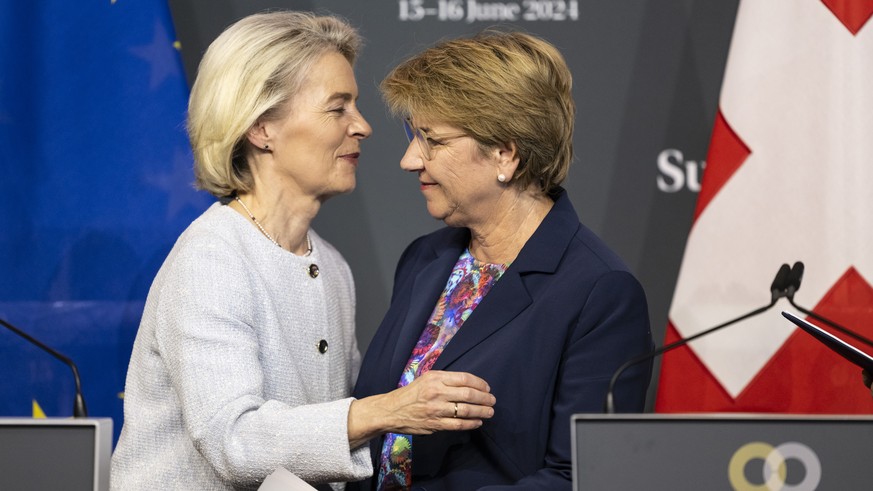 epa11415403 President of the European Commission Ursula von der Leyen (L) and Swiss Federal President Viola Amherd say goodbye after the closing press conference of the Summit on Peace in Ukraine in S ...