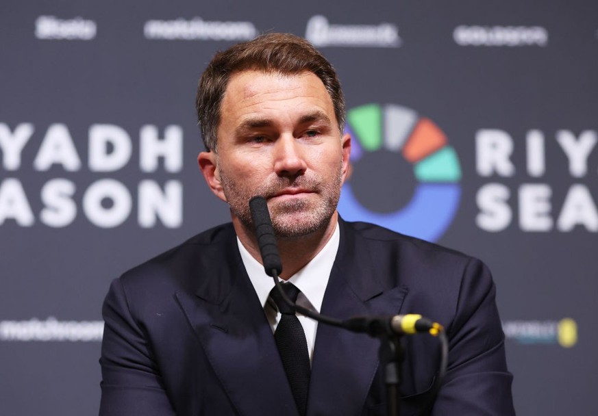LONDON, ENGLAND - SEPTEMBER 21: Eddie Hearn, Boxing promoter and Chairman of Matchroom Sport speaks to the media during a post fight press conference after the IBF World Heavyweight Title fight betwee ...