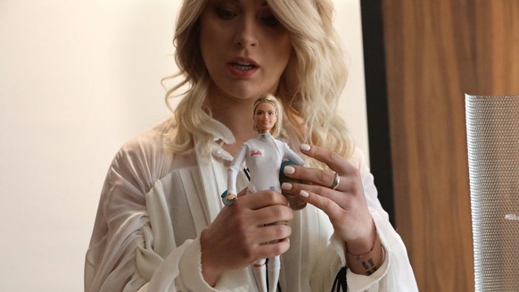 KYIV, UKRAINE - MARCH 4, 2020 - Bronze medallist of 2012 and 2016 Summer Olympics, Ukrainian fencer Olga Kharlan holds her Barbie doll created as part of the Dream Gap Project during a news conference ...