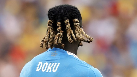 epa11439771 Jeremy Doku of Belgium during the UEFA EURO 2024 Group E soccer match between Ukraine and Belgium, in Stuttgart, Germany, 26 June 2024. EPA/RONALD WITTEK