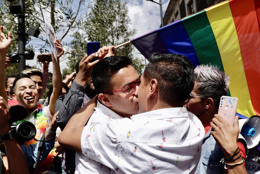 epa10237270 People celebrate the approval of marriage equality in Toluca, Mexico State, Mexico, 11 October 2022. The congress of the state, the most populous in the country, approved reforms 11 Octobe ...