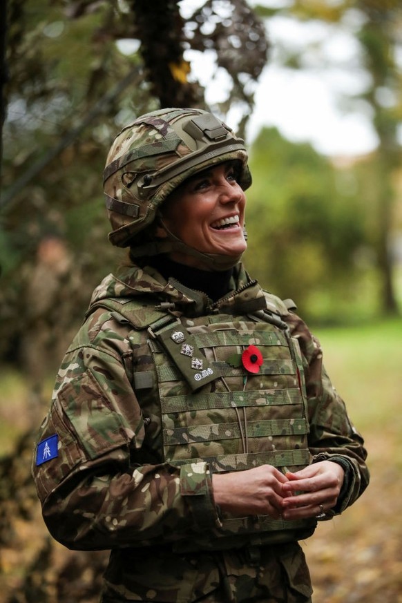 DEREHAM, ENGLAND - NOVEMBER 8: Catherine, Princess of Wales reacts as she visits The Queen's Dragoon Guards Regiment for the first time as their Colonel in Chief on November 8, 2023 in Dereham, E ...