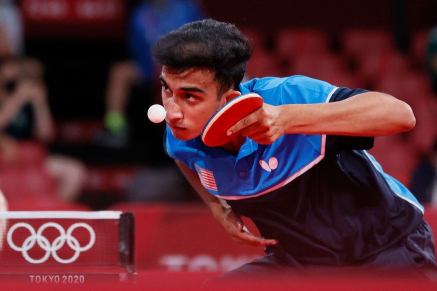 TOKYO, JAPAN - JULY 25: Nikhil Kumar of Team USA in action during his Men's Singles Round 2 match on day two of the Tokyo 2020 Olympic Games at Tokyo Metropolitan Gymnasium on July 25, 2021 in To ...