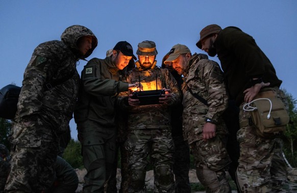 LVIV REGION, UKRAINE - MAY 11: Ukrainian military learn to fly drones at night using thermal vision on May 11, 2023 in Lviv region Ukraine. The school is funded by KOLO, a Ukrainian foundation running ...