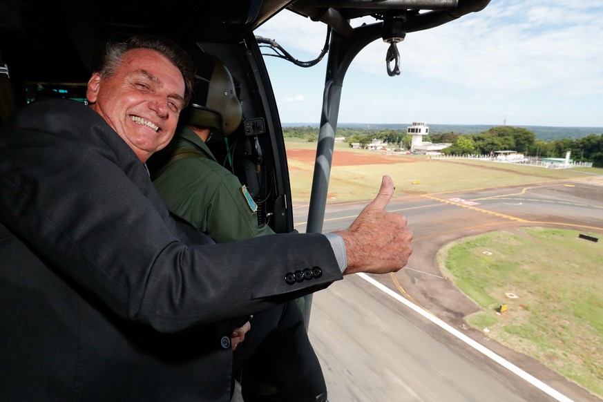 epa09121276 A handout photo made available by the Presidency of Brazil shows President Jair Bolsonaro during his trip to Itaipu to participate in the inauguration ceremony of the new Brazilian General ...