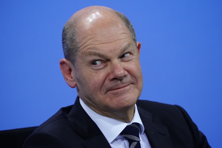 epaselect epa09589849 Acting German Minister of Finance and Social Democratic Party (SPD) top candidate for the Chancellor Olaf Scholz during a press conference after a meeting between German State Pr ...