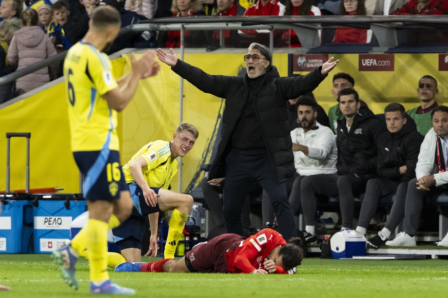 epa12445675 Switzerland's head coach Murat Yakin gestures during the 2026 FIFA World Cup qualifying soccer match between Sweden and Switzerland in Stockholm, Sweden, 10 October 2025. EPA/ANTHONY  ...