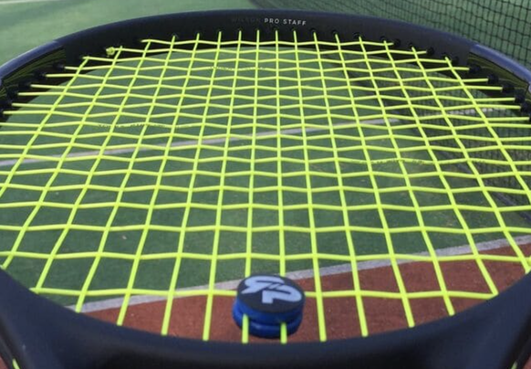 Antivibrateurs raquettes de tennis