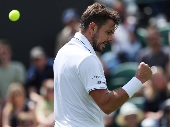 epa10729526 Stan Wawrinka of Switzerland reacts during his Men&#039;s Singles 2nd round match against Martin Etcheverry of Argentina at the Wimbledon Championships, Wimbledon, Britain, 06 July 2023. E ...