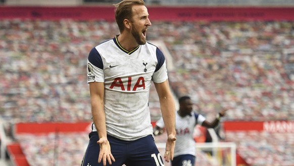 Tottenham&#039;s Harry Kane celebrates after scoring his side&#039;s third goal during the English Premier League soccer match between Manchester United and Tottenham Hotspur at Old Trafford in Manche ...