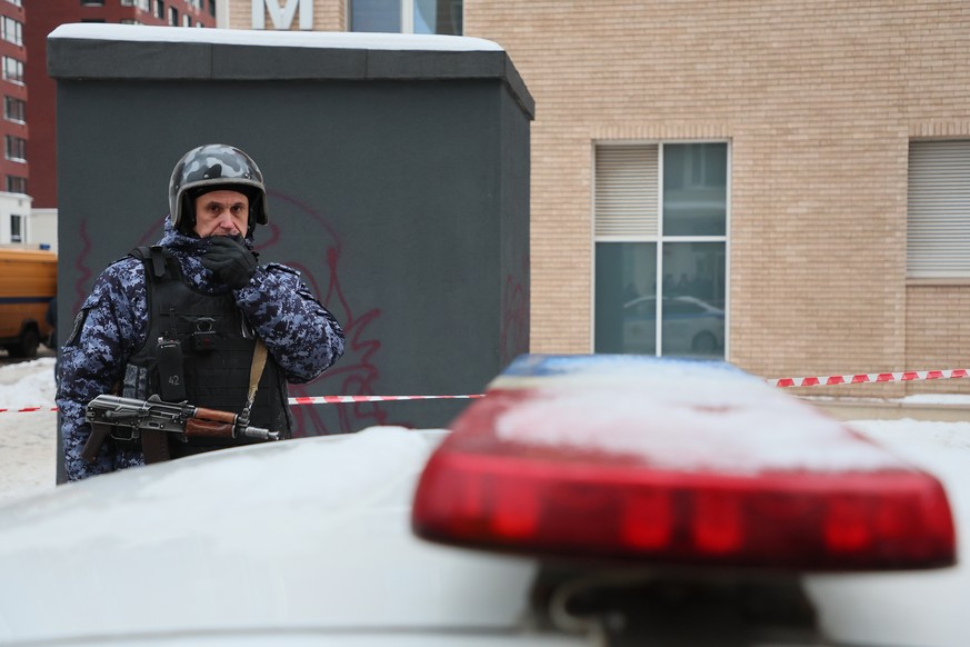 epa11781884 A police officer stands guard near a scene of an explosion in Moscow, Russia 17 December 2024. According to a statement by the Investigative Committee of Russia, Lieutenant General Igor Ki ...