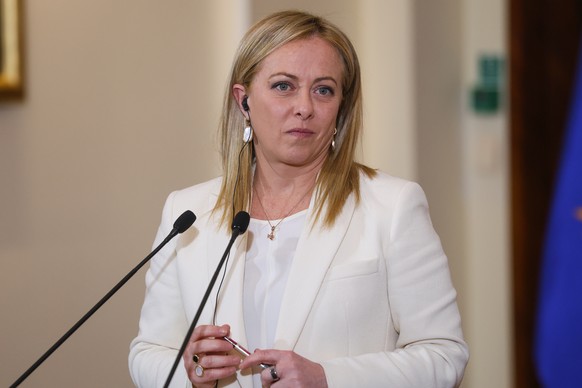 epa10480419 Italian Prime Minister Giorgia Meloni addresses a joint press conference with her Polish counterpart Morawiecki after their meeting in Warsaw, Poland, 20 February 2023. EPA/Rafal Guz POLAN ...