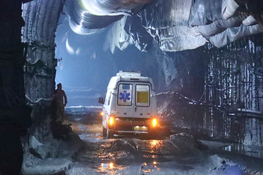 In this image provided by the Information and Public Relations Department, Government of Sikkim, an ambulance moves through an under-construction tunnel at a hydropower project in Samardung village, a ...