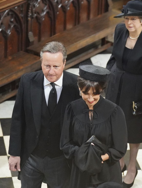 Former British prime minister David Cameron and his wife Samanatha Cameron arrive for the funeral service of Queen Elizabeth II at Westminster Abbey in central London, Monday Sept. 19, 2022. The Queen ...