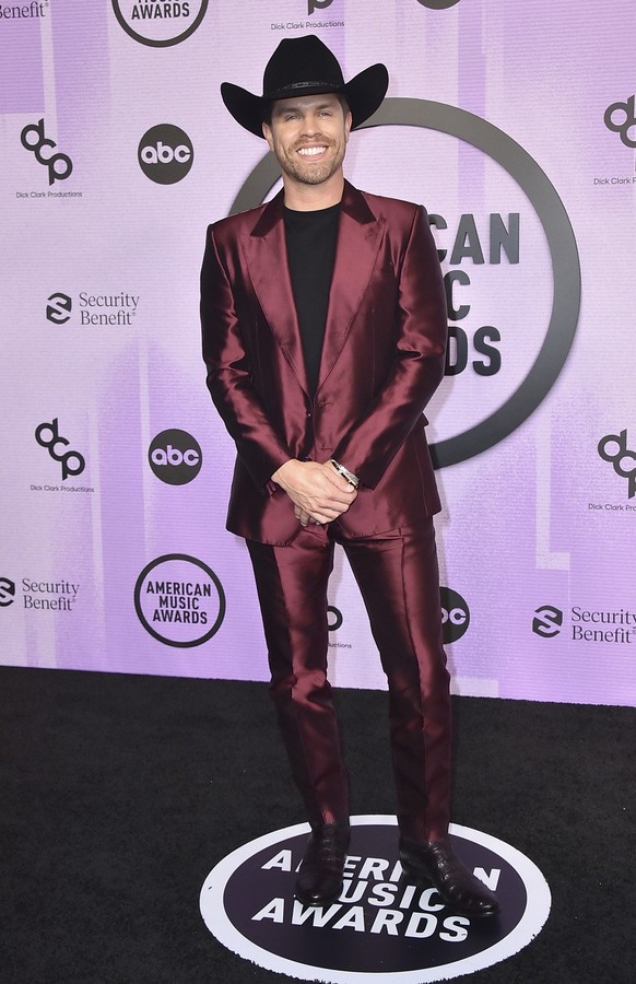 Dustin Lynch arrives at the American Music Awards on Sunday, Nov. 20, 2022, at the Microsoft Theater in Los Angeles. (Photo by Jordan Strauss/Invision/AP)