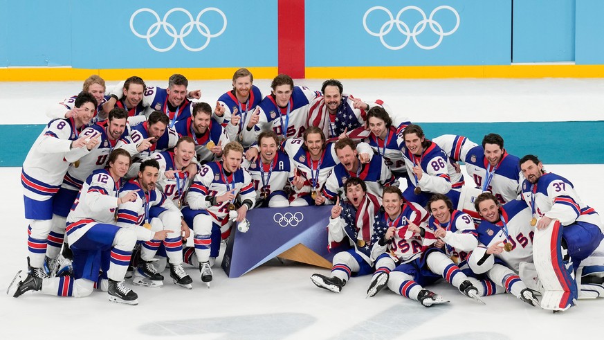 Team USA poses for a group photo after defeating Canada in the men's ice hockey gold medal game at the 2026 Winter Olympics, in Milan, Italy, Sunday, Feb. 22, 2026. (AP Photo/Luca Bruno)
Milan Co ...
