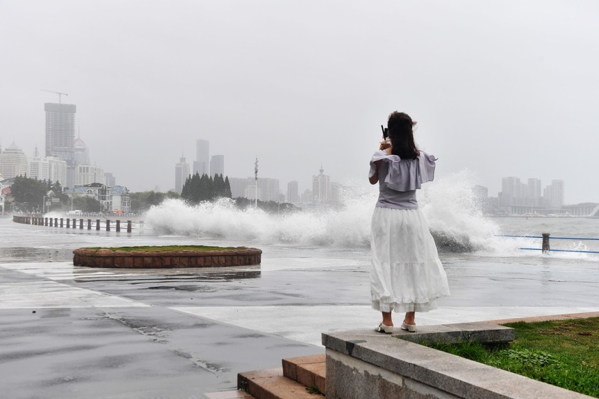 Waves crash on the shore ahead of Typhoon Bavi in Qingdao in eastern China's Shandong province, Sunday, July 12, 202 (Chinatopix Via AP) CHINA OUT