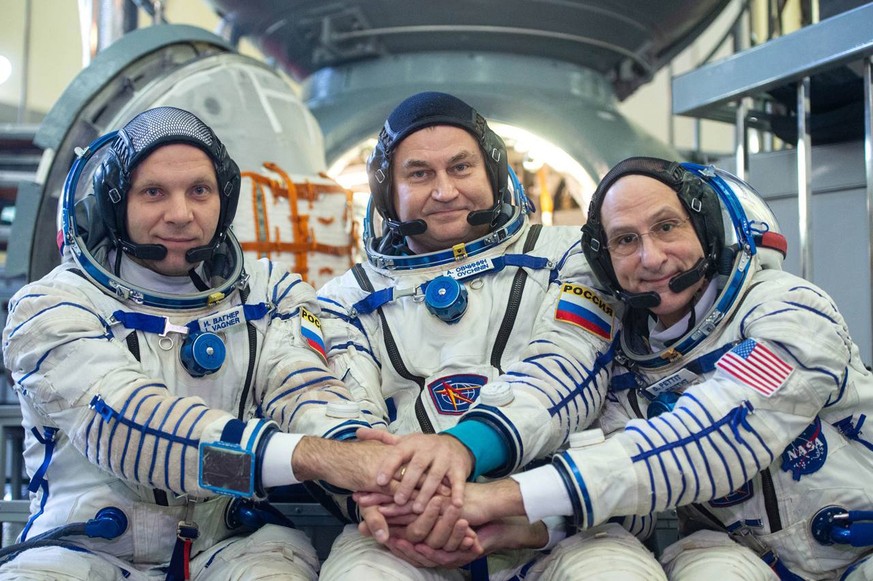 In this photo released by Gagarin Research And Test Cosmonaut Training Center on Wednesday, Aug. 21, 2024, crew members of International Space Station Expedition 71/72 Roscosmos cosmonauts Ivan Vagner ...