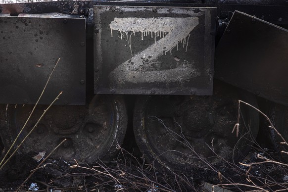 epa09991201 (FILE) - A destroyed Russian tank with the letter &#039;Z&#039; next to damaged houses in village Mala Rohan, near Kharkiv, Ukraine, 31 March 2022 (reissued 03 June 2022). 04 June 2022 mar ...