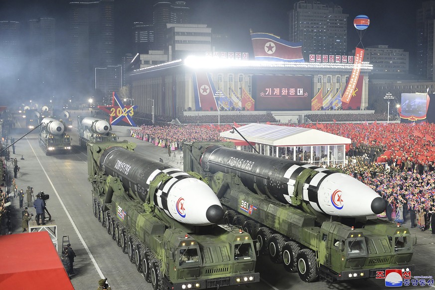 FILE - This photo provided by the North Korean government, shows what it says is Hwasong-17 intercontinental ballistic missiles during a military parade to mark the 75th founding anniversary of the Ko ...