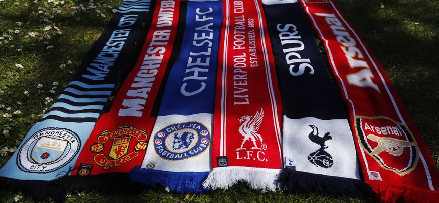A selection of scarves of the English soccer Premier League teams who are reported to be part of a proposed European Super League, laid out and photographed, in London, Monday, April 19, 2021. The 12  ...