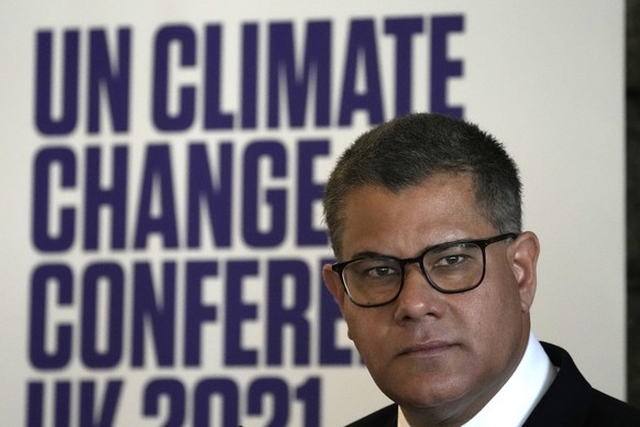 President of the 2021 United Nations Climate Change Conference, COP26, Alok Sharma answers a reporter during a press conference at UNESCO headquarters in Paris, Tuesday, Oct. 12, 2021. Sharma met with ...