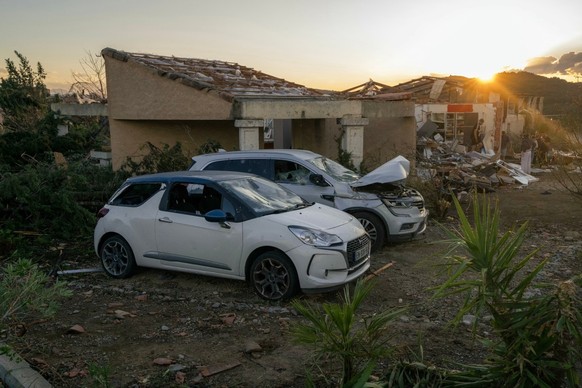 This photograph taken on August 24, 2026, shows damaged houses after a tornado struck Pomas, southwestern France. A tornado struck the Aude department on August 24 as part of southwestern France remai ...