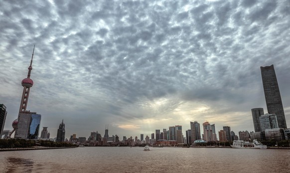 epa10209252 A boat sails on the Huangpu river in Shanghai, China, 27 September 2022. China&#039;s Industrial profits declined by 2.1 per cent year-on-year in the first eight months of 2022, according  ...