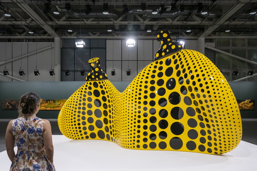 epa11402282 The artwork &#039;Aspiring to Pumpkin&#039;s Love, the Love in My Heart&#039; (2023) by Japanese artist Yayoi Kusama on display at the show Art Unlimited in the context of the internationa ...