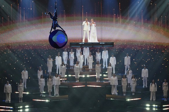 Russian singers Dima Bilan and Polina Gagarina perform during the opening of the International Music Competition &quot;Intervision&quot; at the Live Arena outside Moscow, Russia, Saturday, Sept. 20, 2 ...