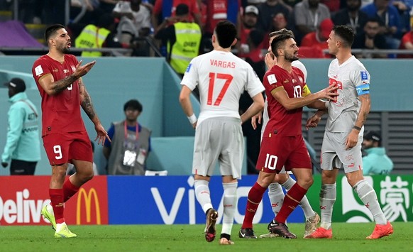 epa10345249 Players argue during the FIFA World Cup 2022 group G soccer match between Serbia and Switzerland at Stadium 947 in Doha, Qatar, 02 December 2022. EPA/Georgi Licovski