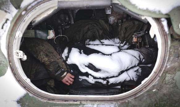 The dead bodies of soldiers are seen in military vehicle on a road in the town of Bucha, close to the capital Kyiv, Ukraine, Tuesday, March 1, 2022. Russia on Tuesday stepped up shelling of Kharkiv, U ...